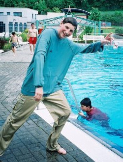 swimming with hoodie in pool